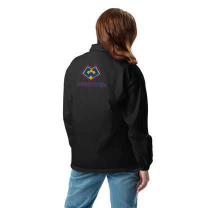 Back angle view of a woman wearing a Wuanderful Locos windbreaker jacket