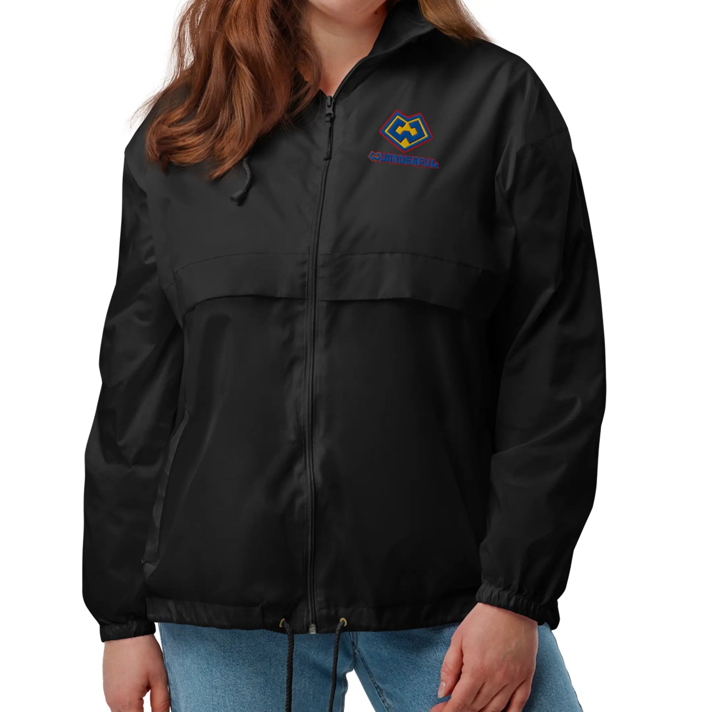 Front angle view of a woman wearing a black Wuanderful Locos windbreaker jacket